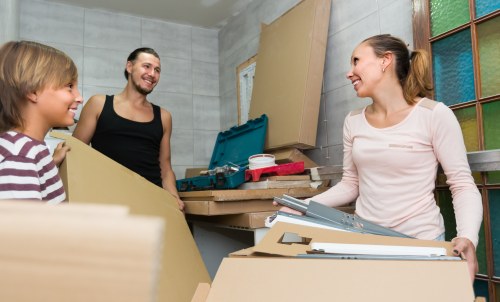 Removal team planning a residential move in Highbury with boxes and furniture