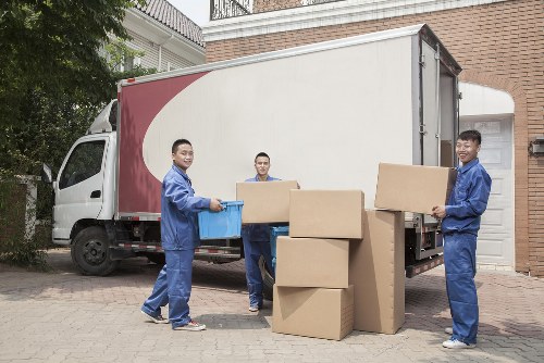 Removal truck and moving team preparing for a house move in Highbury