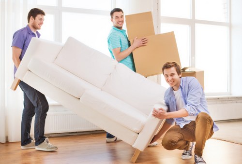 Careful handling of office furniture during a Highbury relocation