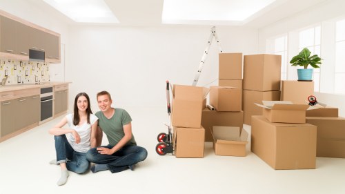 Office furniture and workstations being moved for a Highbury business relocation