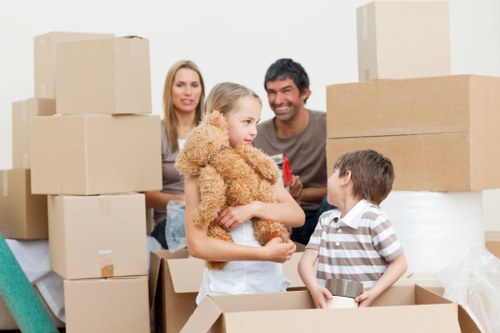 Loading household furniture into a removal van